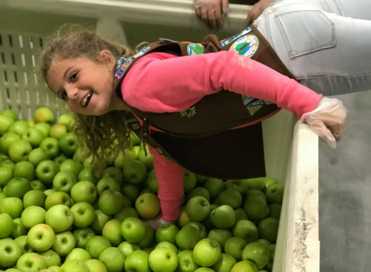 girl scout and apples