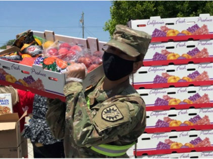 national guardsman with boxes